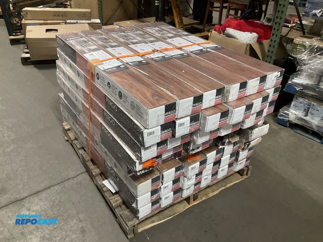 Lot 2-60429 - Skid lot of Pergo Outlast + Waterproof Laminated Wood Flooring of Various Shades, Most are Applewood...