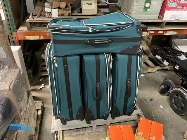 Lot 2-36500 - (4) Leisure International blue suitcases each one has 4 pockets, 19”x8”x30.5”H, used