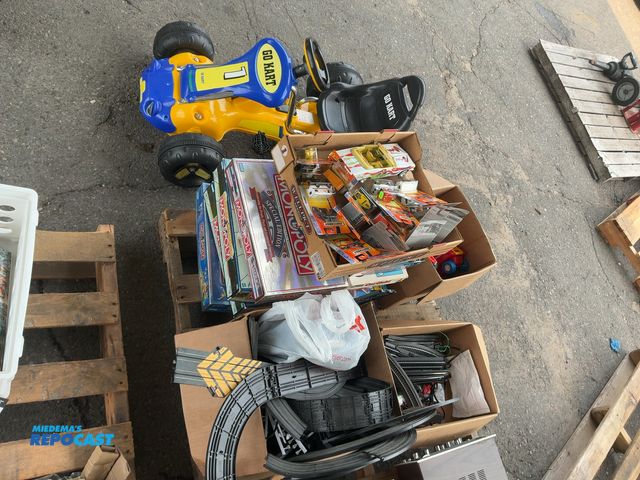 Lot 2-18258 - Lot of toys including, train track pieces, matchbox cars, many board games, and a petal go-cart