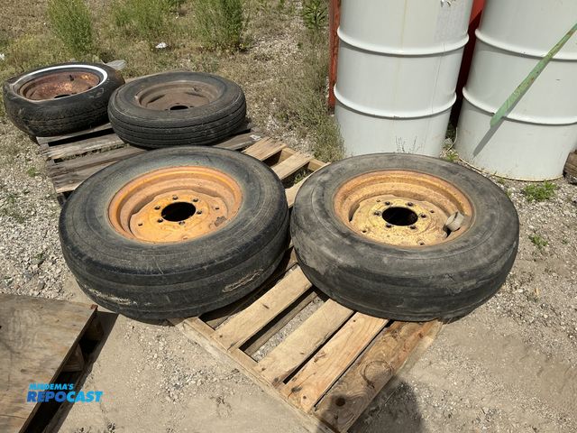 Lot 2-64032 - matched sets of farm implement 4-bolt hub wheels and tries, have 15" tires, universal fitting, 4-bol...
