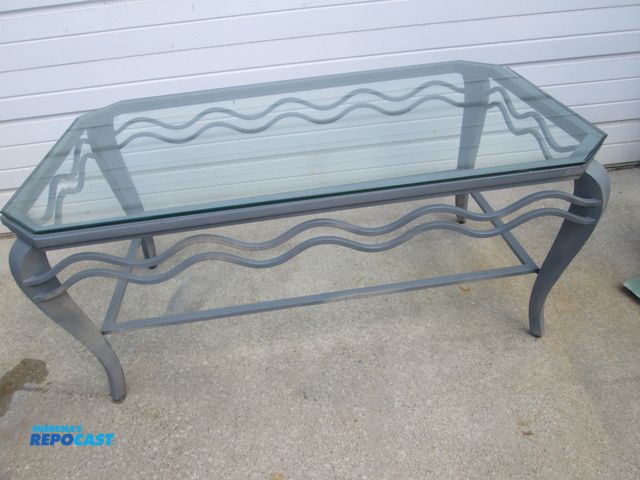 Lot 2-56968 - Metal Ornate Table w/ 1/2" glass recycled top - Glass is removeable 30" x 49" x 22" high