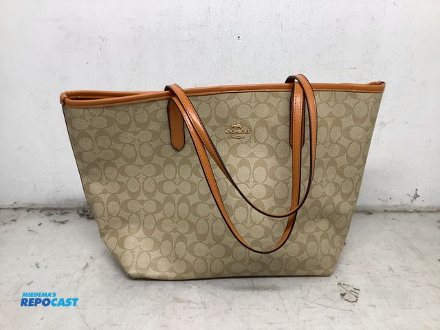 Lot 2-75991 - New Coach New York City tote bag in signature canvas with light khaki and saddle leather trim