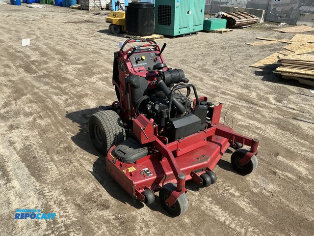Lot 2-65841 - Toro 74583 Stand-On Riding Lawn Mower Toro GrandStand Mower, With 60in TURBO FORCE Cutting Unit