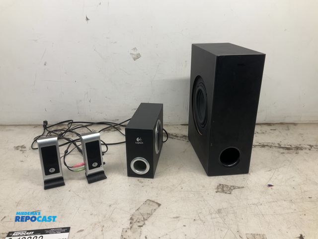 Lot 2-19382 - Lot of (4) Speakers: (3) are Logitech and (1) is an Onn Subwoofer
