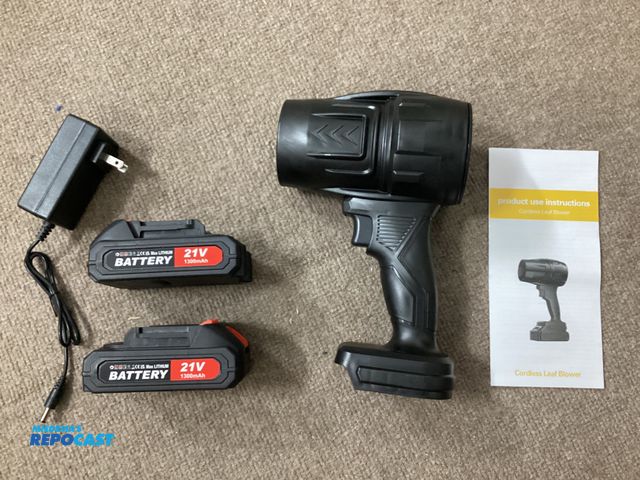 Lot 2-91295 - Cordless Battery Powered New Cordless leaf blower. Good for blowing out a garage. Includes 2-21 volt...