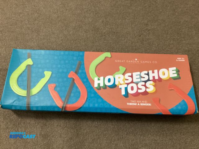 Lot 2-77762 - New Horseshoe Toss Set. Includes 4 Metal shoes, two metal stakes and instructions.