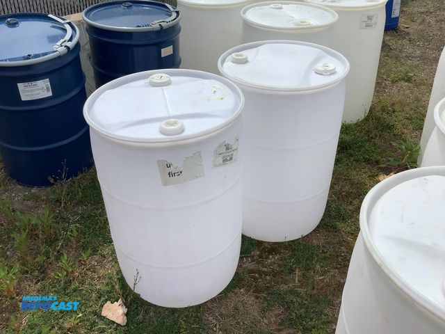 Lot 2-15584 - lot of 2 55 gallon white plastic barrels with 2 removable bungs, contained vinegar