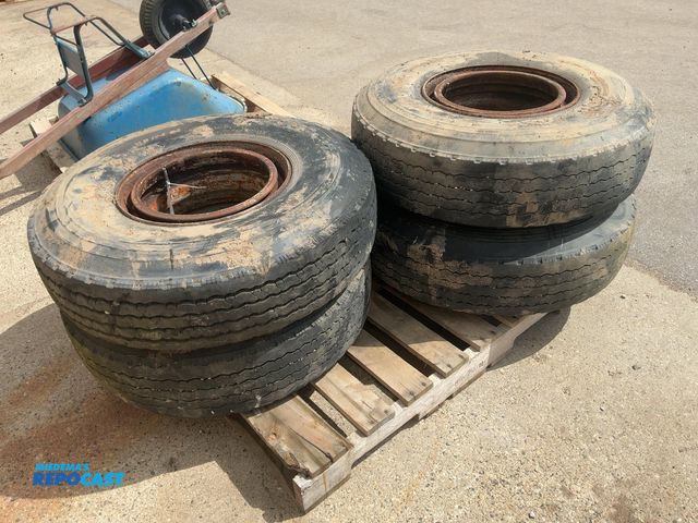 Lot 2-11030 - (4) Used 11R17.5 Tires on Steel Dayton Style Wheels, one is flat