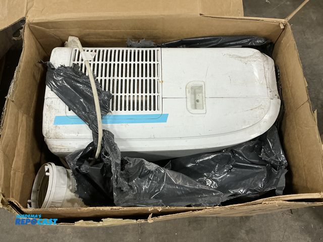 Lot 2-92111 - Rolling ac unit- has scratches and cracks