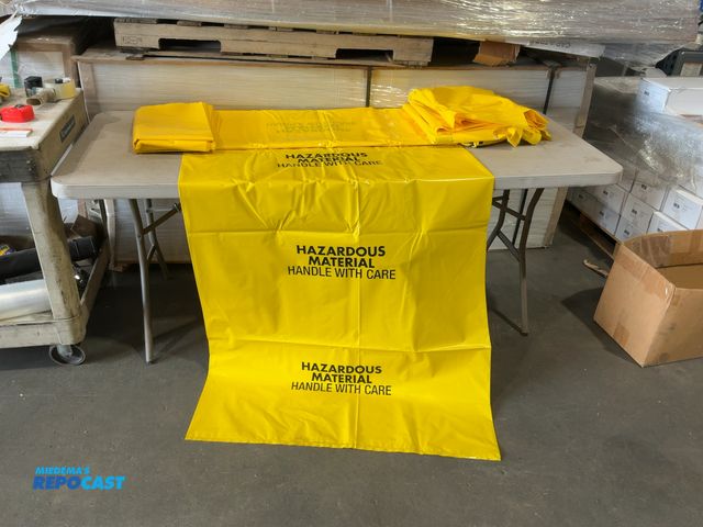 Lot 2-67626 - Box of Plastic All-Weather Hazardous Material Signs- 39”x60” (qty. unknown)