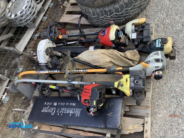 Lot 2-14754 - Skid lot of assorted lawn care items for parts and repair including: weed wackers, chainsaw, ryombi ...