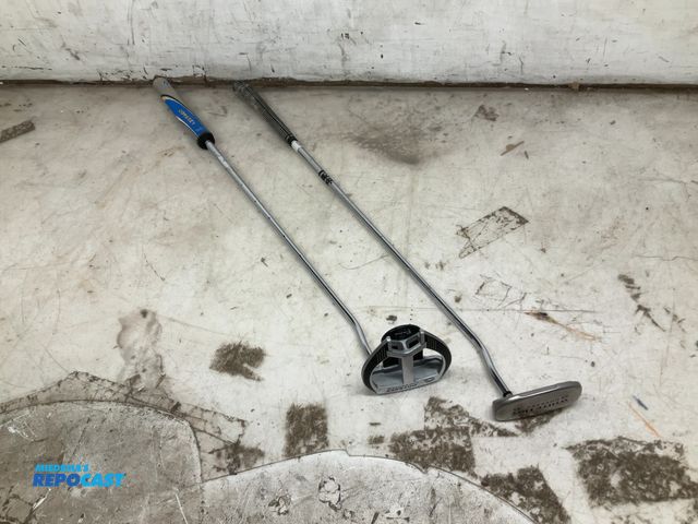 Lot 2-67483 - 2 odyssey putters, a white hot and a 2 ball whit fang, both 35"