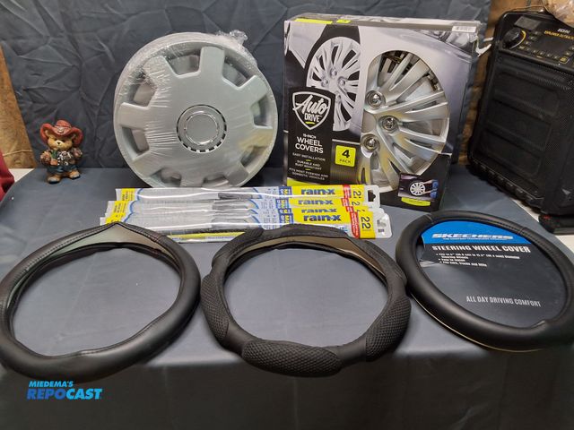 Lot 2-76837 - LOT OF WHEEL COVERS, WINDSHIELD WIPERS AND STEERING WHEEL COVERS.