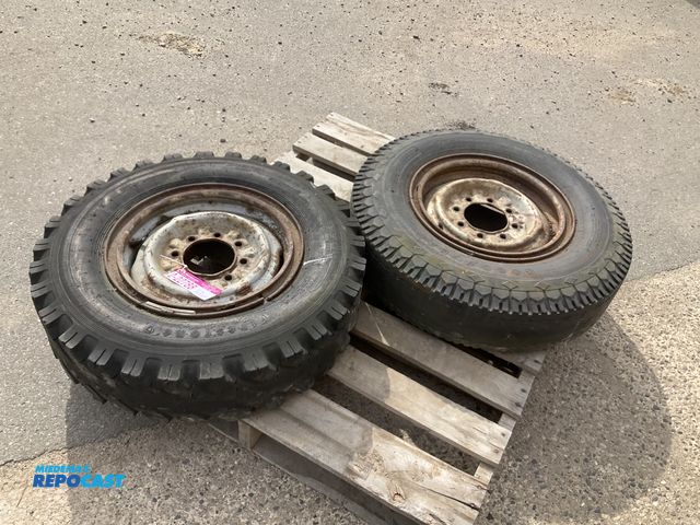Lot 2-22788 - (2) 7.50-16LT tires on steel 8-bolt wheels, used, tires are weathered and worn