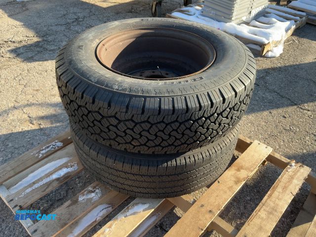 Lot 2-19631 - Lot of (2) BFGoodrich Rugged Trail T/A Tires LT245/75R17 with 8 Lug Rims