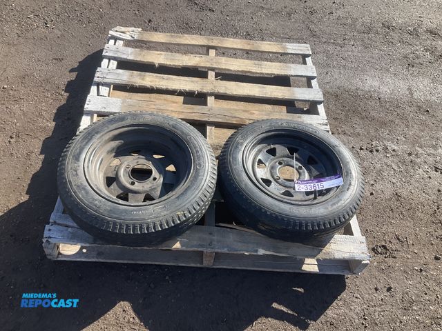 Lot 2-33615 - (2) 4.80-12 trailer tires in steel 4-bolt wheels, used