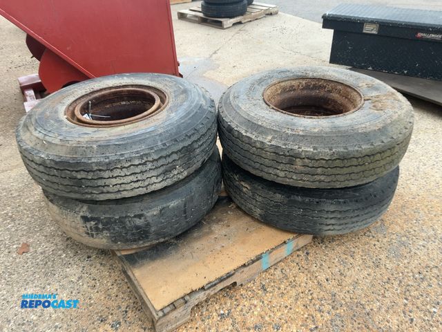 Lot 2-11044 - (4) Used 11R17.5 Tires on Steel Dayton Style Wheels, one is flat