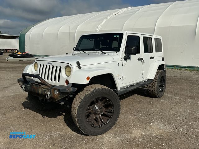 Lot 2-30215 - 2013 Jeep Wrangler Unlimited Sahara 4WD SUV 4x4