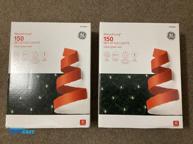 Lot 2-67344 - Two new GE String A Long Net-style Christmas lights. Clear bulbs with green wire. Connect up to 3 se...