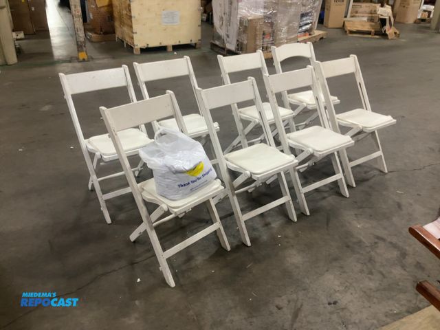 Lot 2-18000 - Lot of (8) padded folding chairs with bags of new chair covers