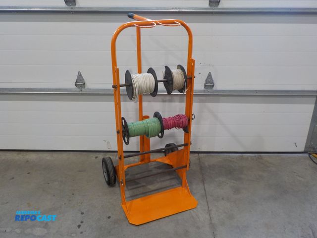 Lot 2-30276 - Electrical wire caddy cart with 4 spools of electrical wire. Hard tires. Four adjustable rods. 46" t...