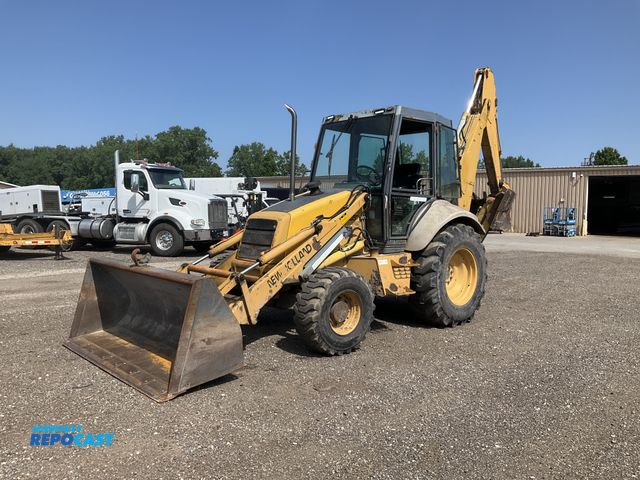 Lot 2-44280 - New Holland 555E Backhoe Loader