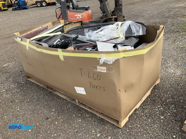 Lot 2-11079 - Skid of used semi truck truck interior parts including dash panels, trim, climate control panels, ve...