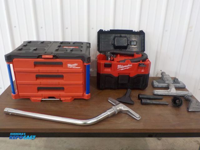Lot 2-34219 - Milwaukee Packout and Milwaukee vac. 18V battery. Vac attachments.