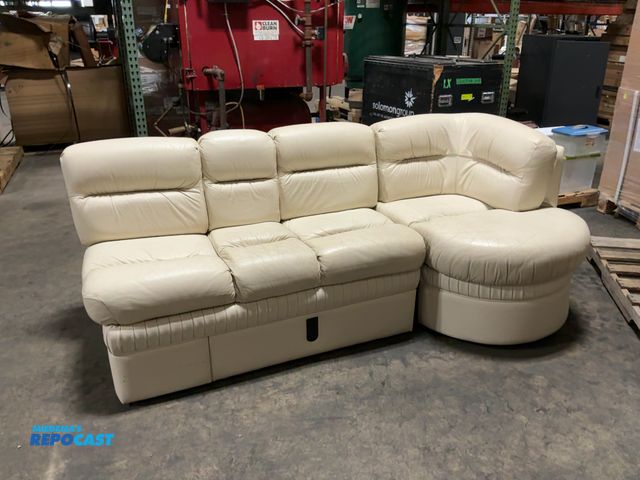 Lot 2-99730 - white leather j-couch removed from an 2000 Monaco signature series motor home