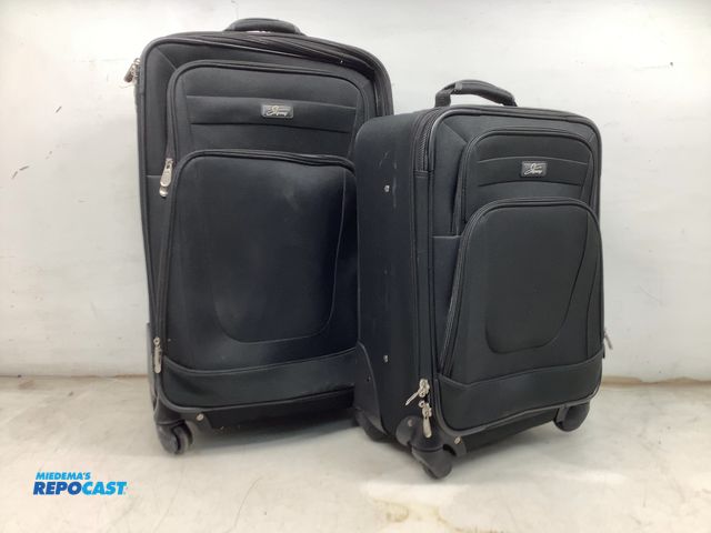 Lot 2-92404 - pair of Skyway Suitcases - rolling wheels, telescoping pull handles, zippers functioning