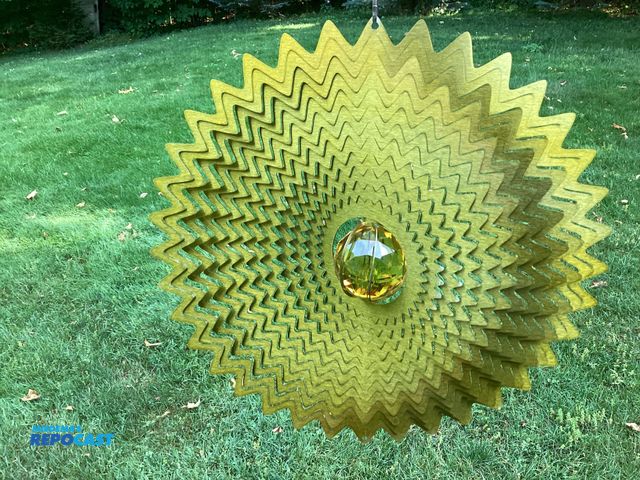 Lot 2-77797 - New Spinfinity Designs wind spinner. Stainless Steel Metallic finish shimmers in the sunlight and tw...