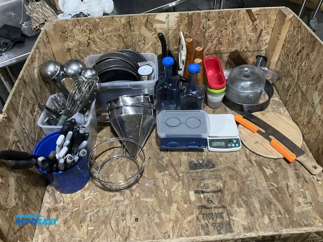 Lot 2-55077 - Entire contents only of tote shown in photos. Includes assorted knives, ladles, whisks, (4) 10” spri...