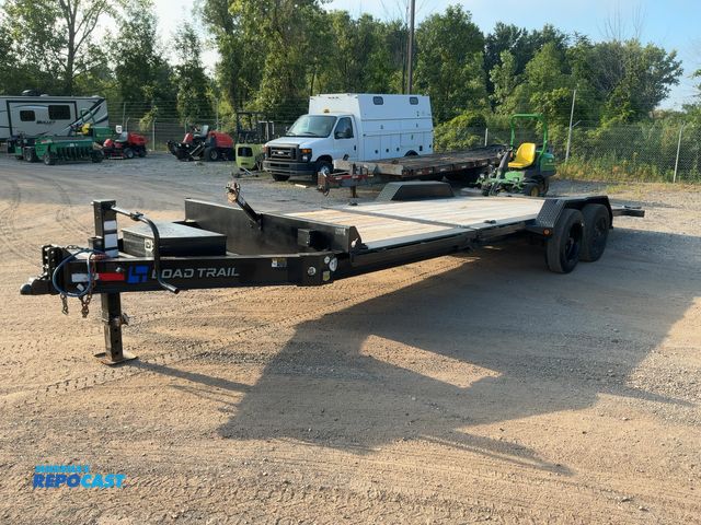Lot 2-99074 - 2024 Load Trailer Flat Bed Trailer All of tires have uneven wear, 2 tires have chunks taken out of t...