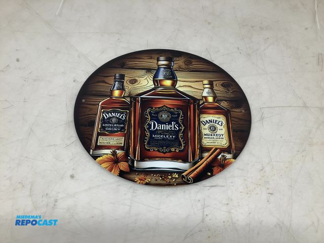 Lot 2-74500 - 7.75” Diameter Circular Metal “Daniel’s” Sign with Pre-Drilled Holes for Hanging