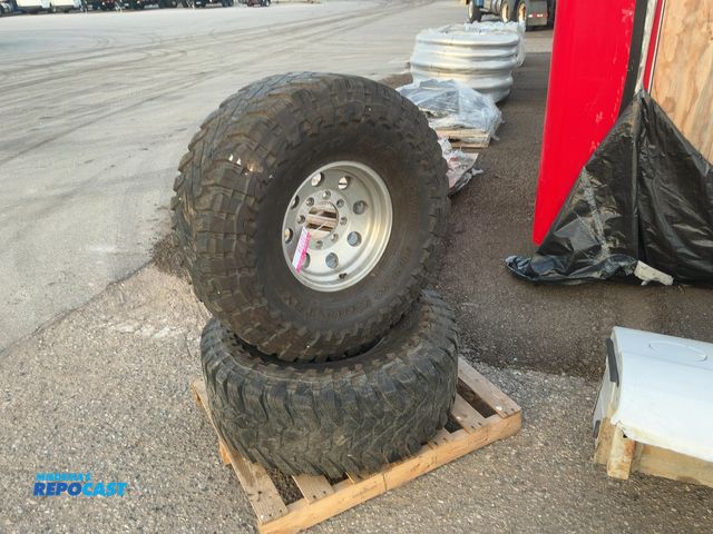 Lot 2-22739 - (2) Used Toyo M/T Open Country Size 385/70R16 Tires on Aluminum 8-lug Wheels, believed to be Ford 8-...