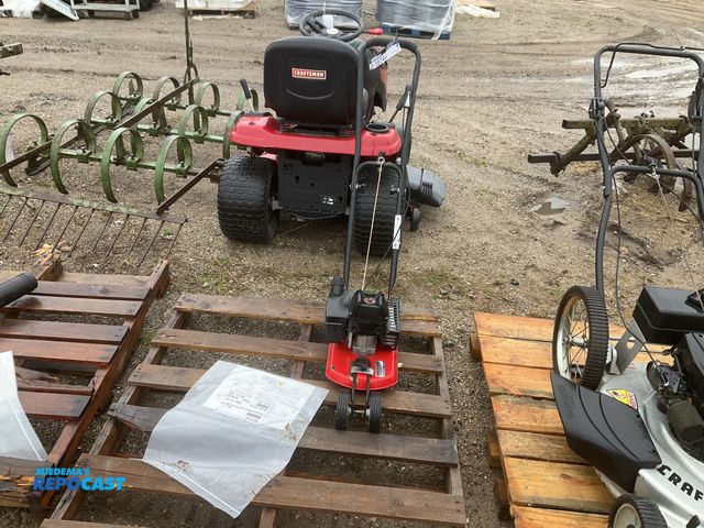 Lot 2-15744 - easy trim walk behind trimmer model 154902 S/N 12399 includes owners manual have not hear run