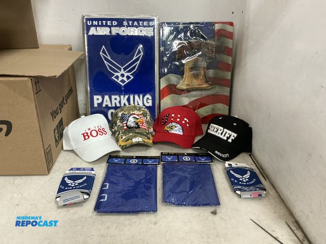 Lot 2-73431 - New Lot of various United States and Air Force memorabilia items, including hats, banners and more.