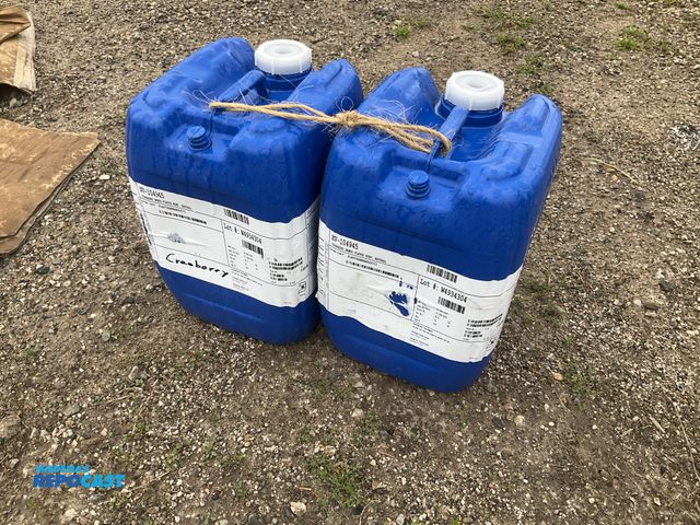 Lot 2-34910 - lot of 2 5 gallon blue plastic containers, contained cranberry juice