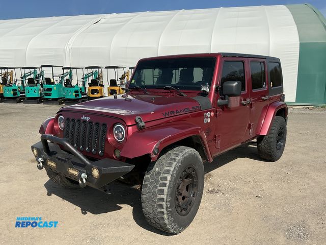 Lot 2-31016 - 2011 Jeep Wrangler Unlimited Sahara 4WD SUV 4x4