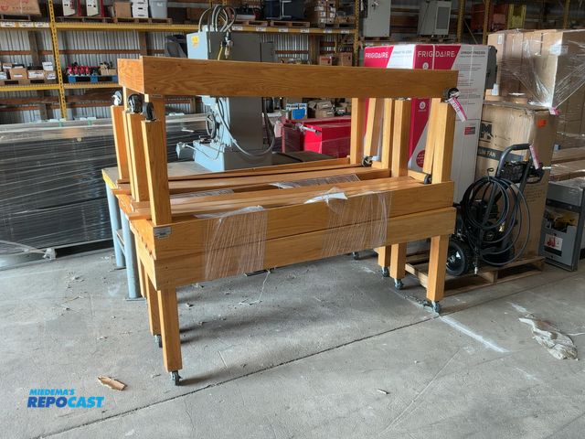 Lot 2-21246 - (5) Used CMS Wood Merchandising Tables on Casters, four are 6'x20"x28" tall, one is 6'x30"x28" tall ...