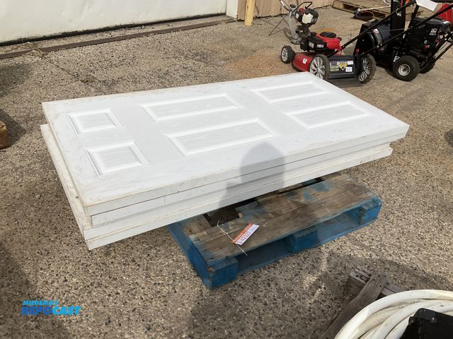 Lot 2-42327 - (5) 72”T x 36”W x 1-3/4” solid core wood door panels, unused, all have scattered scuffs, scrapes and...