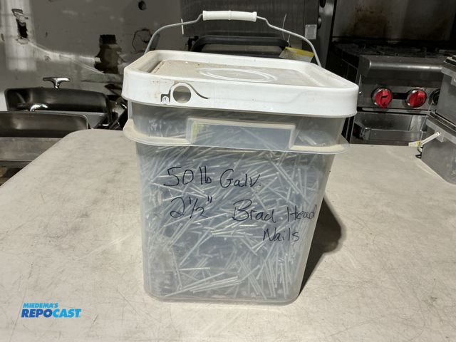 Lot 2-39481 - New 50lb bucket of 2-1/2” galvanized Brad head nails.