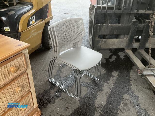 Lot 2-15747 - (3) or stackable chairs, color gray, unique pattern on the back rest