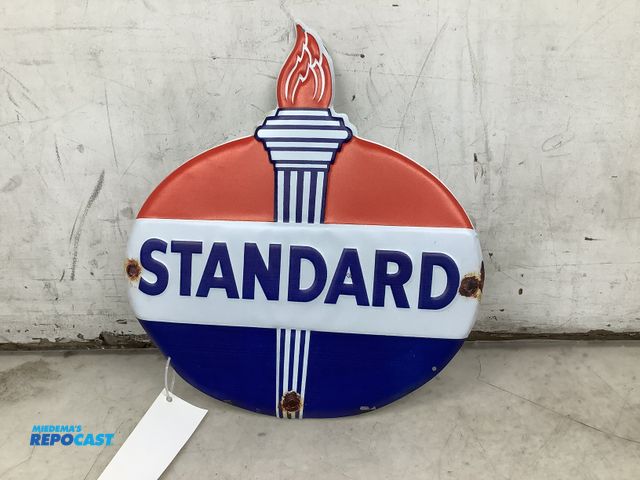 Lot 2-59050 - standard oil/gas dirt cut embossed metal sign 14" x 16"