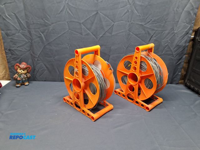Lot 2-76833 - (2) REELS FULL OF FENCING WIRE OR WELDING WIRE