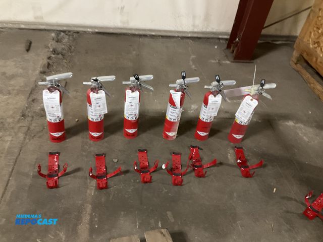 Lot 2-21009 - (6) 2-1/2 lb dry chemical fire extinguishers with metal wall mount brackets, all were last inspected...