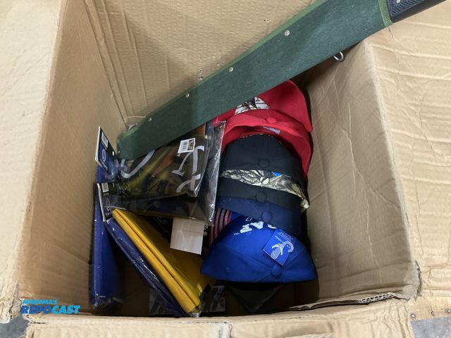 Lot 2-96823 - lot includes various knives, ballcaps, flags...