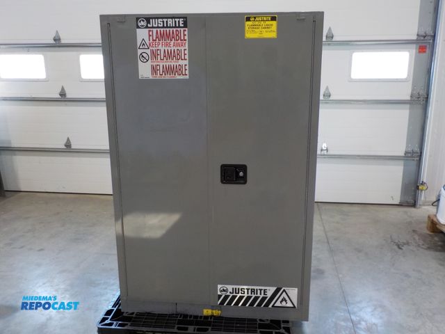 Lot 2-34096 - JustRite flamable liquid storage cabinet. (2) 30 gallon capacity. Three adjustable shelves. Ground c...
