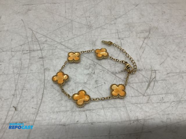 Lot 2-74044 - New Four leaf (orange stone) clover, gold-toned chain station bracelet
