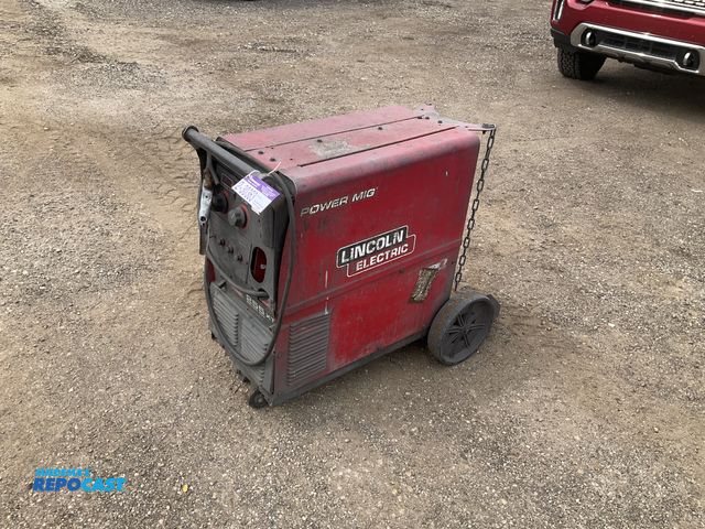 Lot 2-30363 - Lincoln Electric 255 XT Power Mig Welder for parts or repair, 230/460/575 volt single phase input, m...